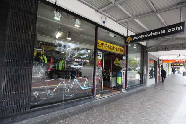 Woolys has always had a strong street presence, but the signage was not cohesive and diluted the overall impact.